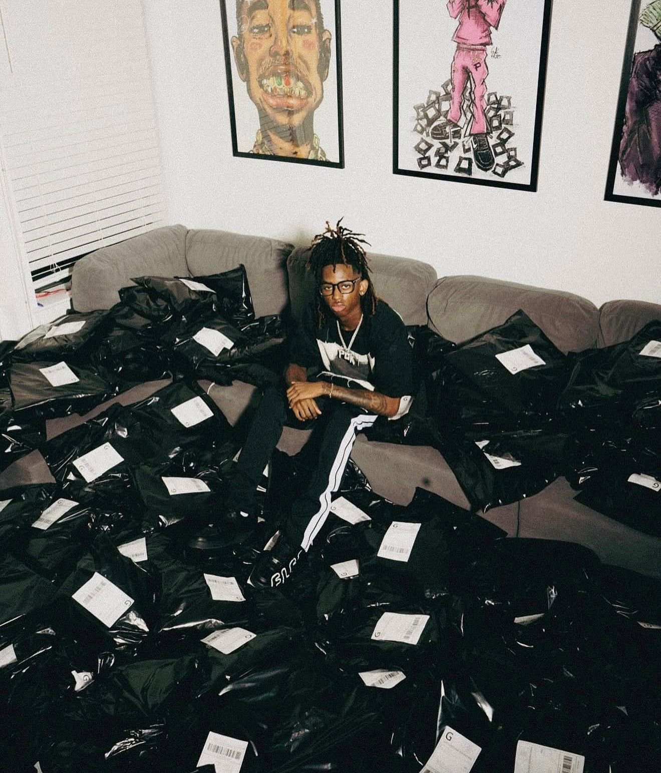 Seated among packaged orders — the business behind the brand